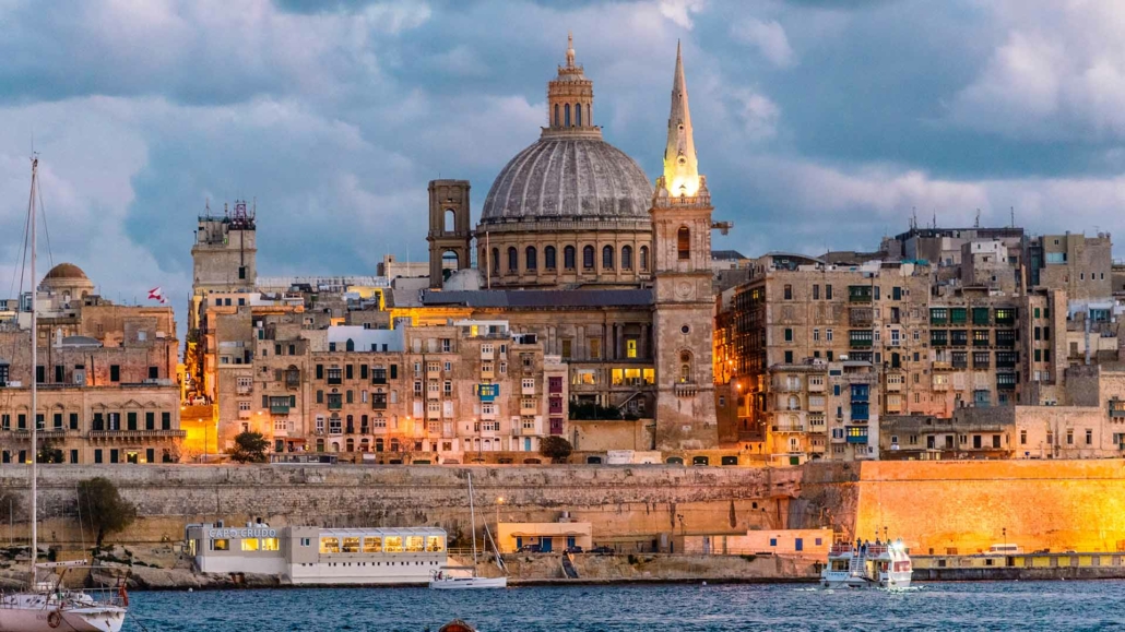 Panoramic view of Valletta, Malta’s historic capital, seen from across the harbor.